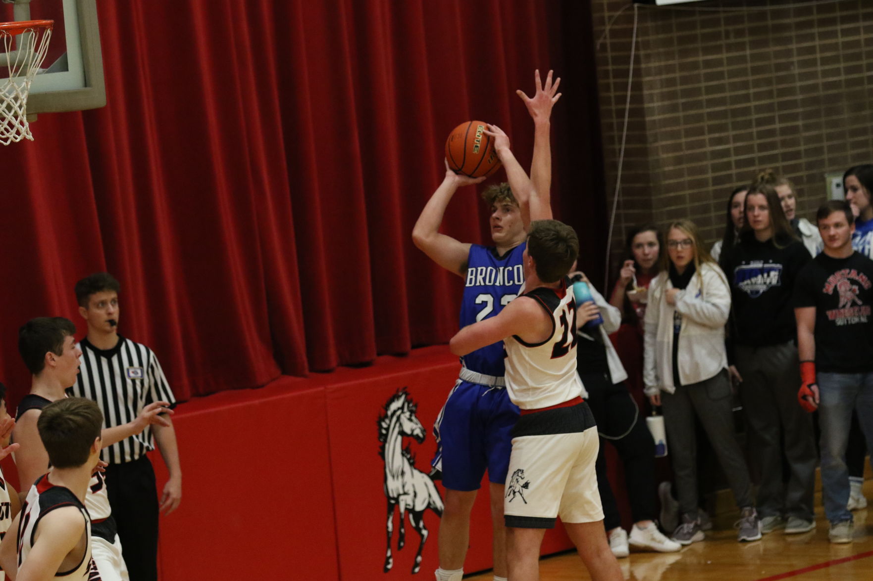 Centennial boys basketball at Sutton 8.JPG